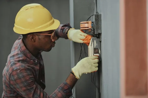 Technician measuring tools and testing appliance